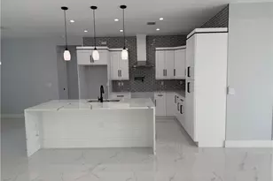 911 Asher St E, Lehigh Acres, FL 33974 - Photo 14