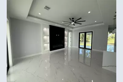 911 Asher St E, Lehigh Acres, FL 33974 - Photo 10