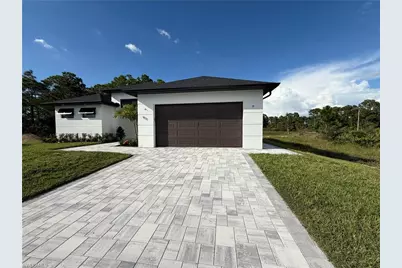 911 Asher St E, Lehigh Acres, FL 33974 - Photo 2