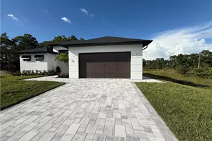 911 Asher St E, Lehigh Acres, FL 33974 - Photo 2