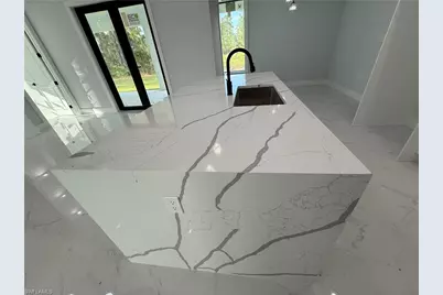 911 Asher St E, Lehigh Acres, FL 33974 - Photo 22