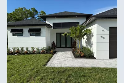 911 Asher St E, Lehigh Acres, FL 33974 - Photo 4