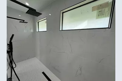 911 Asher St E, Lehigh Acres, FL 33974 - Photo 34