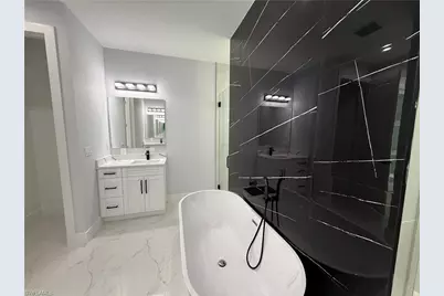 911 Asher St E, Lehigh Acres, FL 33974 - Photo 28