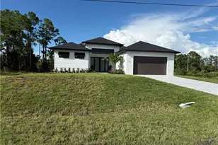 911 Asher St E, Lehigh Acres, FL 33974 - Photo 1