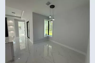 911 Asher St E, Lehigh Acres, FL 33974 - Photo 24