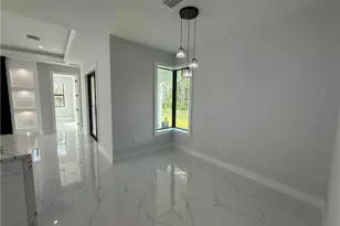 911 Asher St E, Lehigh Acres, FL 33974 - Photo 24