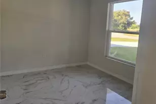 399 Carrillon Ave S, Lehigh Acres, FL 33974 - Photo 12