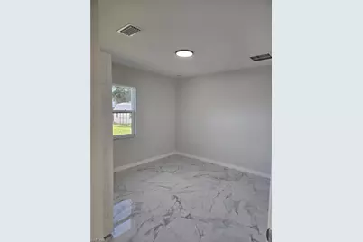 399 Carrillon Ave S, Lehigh Acres, FL 33974 - Photo 10