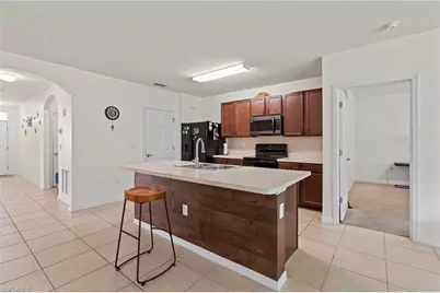 10564 Canal Brook Ln, Lehigh Acres, FL 33936 - Photo 8