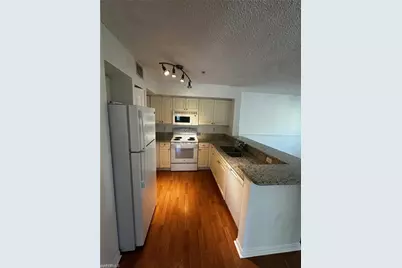 1270 Wildwood Lakes Blvd #202, Naples, FL 34104 - Photo 10