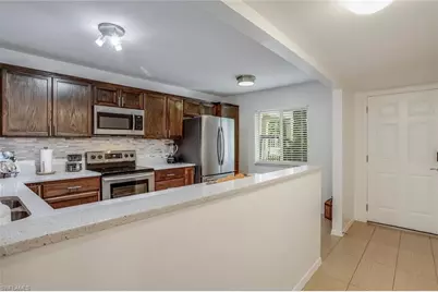 210 Timber Lake Cir #A103, Naples, FL 34104 - Photo 6