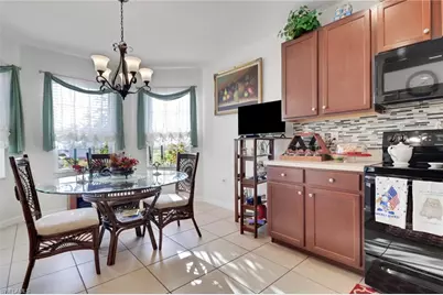 10452 Canal Brook Ln, Lehigh Acres, FL 33936 - Photo 12