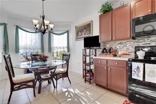 10452 Canal Brook Ln, Lehigh Acres, FL 33936 - Photo 12