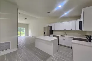 876 Apartment St E, Lehigh Acres, FL 33974 - Photo 4