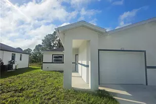 876 Apartment St E, Lehigh Acres, FL 33974 - Photo 2