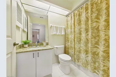 7435 Plumbago Bridge Rd #K201, Naples, FL 34109 - Photo 32