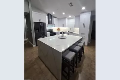 916 Anaconda Ave S, Lehigh Acres, FL 33974 - Photo 4