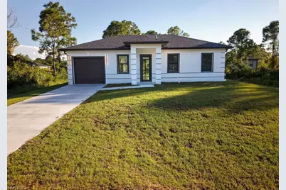 832 Carpenter St E, Lehigh Acres, FL 33974 - Photo 2