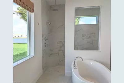 9077 Wisteria Way, Naples, FL 34114 - Photo 28
