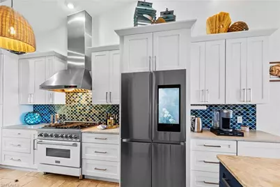 7377 Pineland Rd, Bokeelia, FL 33922 - Photo 6