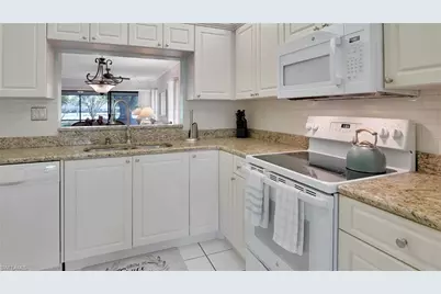 1802 Kings Lake Blvd #105, Naples, FL 34112 - Photo 8