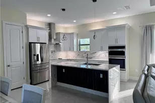 1023 Bank Ave S, Lehigh Acres, FL 33974 - Photo 10