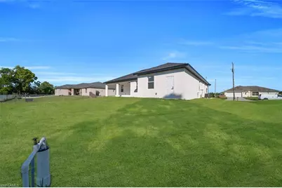 720 Castlestone Ave S, Lehigh Acres, FL 33974 - Photo 32