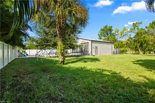 655 Trinity St E, Lehigh Acres, FL 33974 - Photo 6