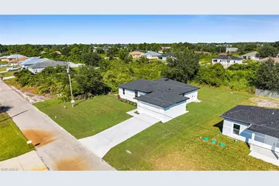 2506 30th St SW, Lehigh Acres, FL 33976 - Photo 28