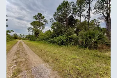 1242 Random St E, Lehigh Acres, FL 33974 - Photo 2