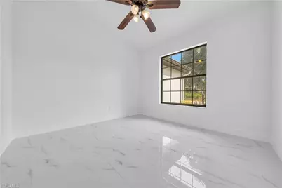 909 Williams Ave, Lehigh Acres, FL 33972 - Photo 16