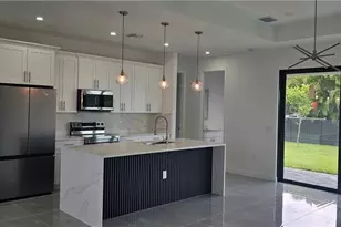 1122 NW 15th St, Cape Coral, FL 33993 - Photo 6