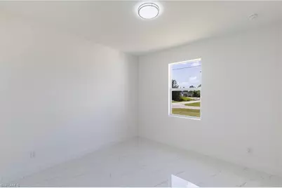 2719 34th St W, Lehigh Acres, FL 33971 - Photo 18