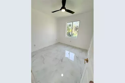 911 Williams Ave, Lehigh Acres, FL 33972 - Photo 28