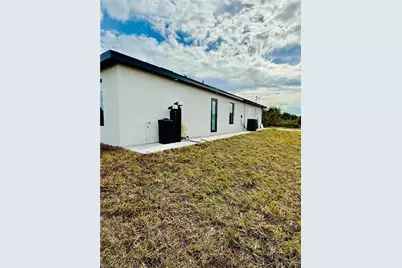 2512 29th St SW, Lehigh Acres, FL 33976 - Photo 30