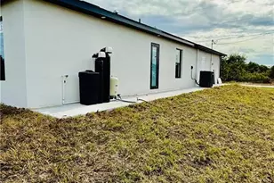 2512 29th St SW, Lehigh Acres, FL 33976 - Photo 30