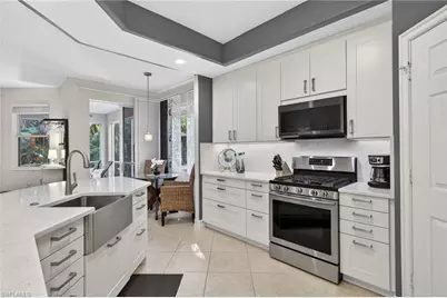 2001 Tarpon Bay Dr N #102, Naples, FL 34119 - Photo 10