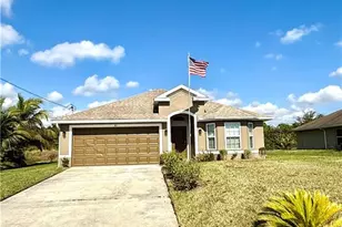 815 Theodore Vail St E, Lehigh Acres, FL 33974 - Photo 2