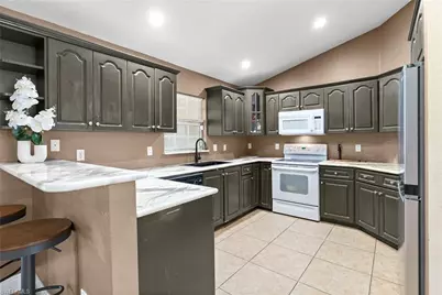1019 Carroll St E, Lehigh Acres, FL 33974 - Photo 14