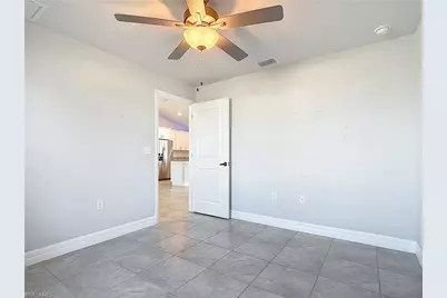 1021 Cedartree Ave, Lehigh Acres, FL 33971 - Photo 20