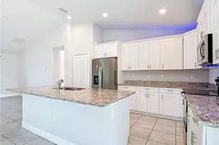 1021 Cedartree Ave, Lehigh Acres, FL 33971 - Photo 14