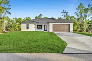 525 Allison St E, Lehigh Acres, FL 33974 - Photo 2