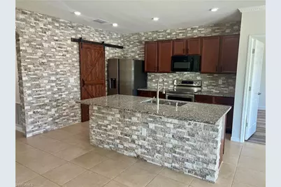 10293 Silver Pond Ln, Lehigh Acres, FL 33936 - Photo 16