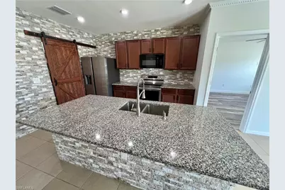 10293 Silver Pond Ln, Lehigh Acres, FL 33936 - Photo 12