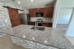 10293 Silver Pond Lane, Lehigh Acres, FL 33936 - Photo 12