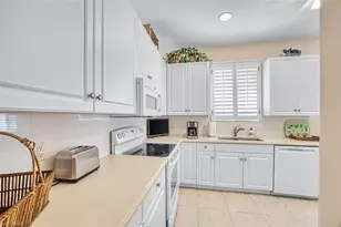 7908 Harmony Lake Ct, Fort Myers, FL 33907 - Photo 14