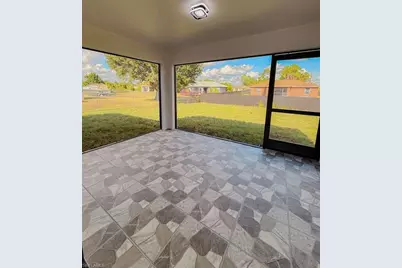 2610 27th St SW, Lehigh Acres, FL 33976 - Photo 6