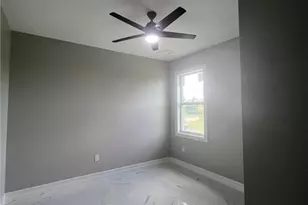 1011 Cedartree Ave, Lehigh Acres, FL 33971 - Photo 14