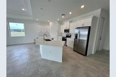 628 Falls Ln, Lehigh Acres, FL 33974 - Photo 18